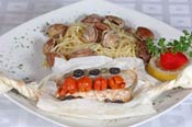 Fresh Fish Filet served with spaghetti and clams at amarone italian restaurant, cabo san lucas, mexico
