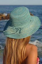 silvina taberna models cabo hats and bikinis on the beach in los cabos, mexico