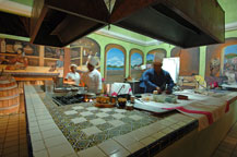 muraled open kitchen at mexico mystic restaurant
